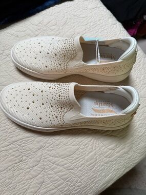 Skechers Slip-On Knit Sneakers in Ivory with Gold Accents